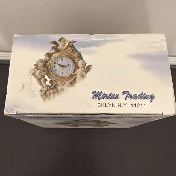 THE MIRELLA COLLECTION CHERUBS QUARTS MANTLE CLOCK - Picture 5 of 5